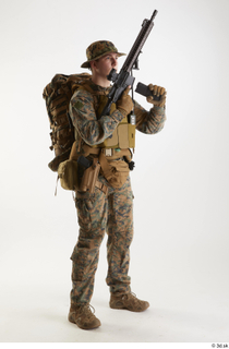Casey Schneider Paratrooper Pose 4 loading gun standing whole body…
